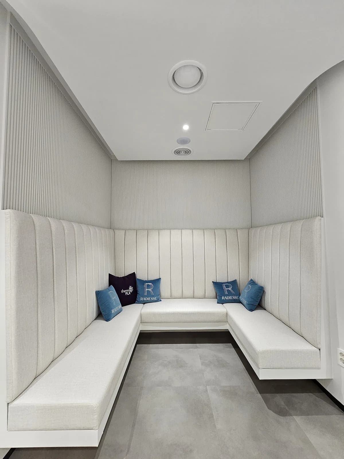 Quiet cushioned seating alcove in the clinic waiting area
